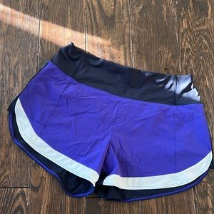 Athleta Womens size small purple Run With It running shorts.  Gently worn